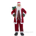 Santa Claus con bolsa de regalo de pie decoración interior